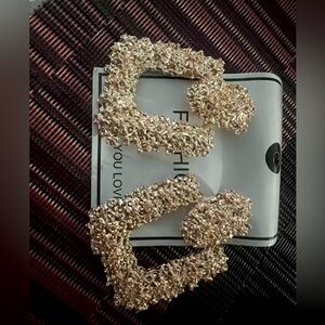 Elegant Textured Gold Earrings”